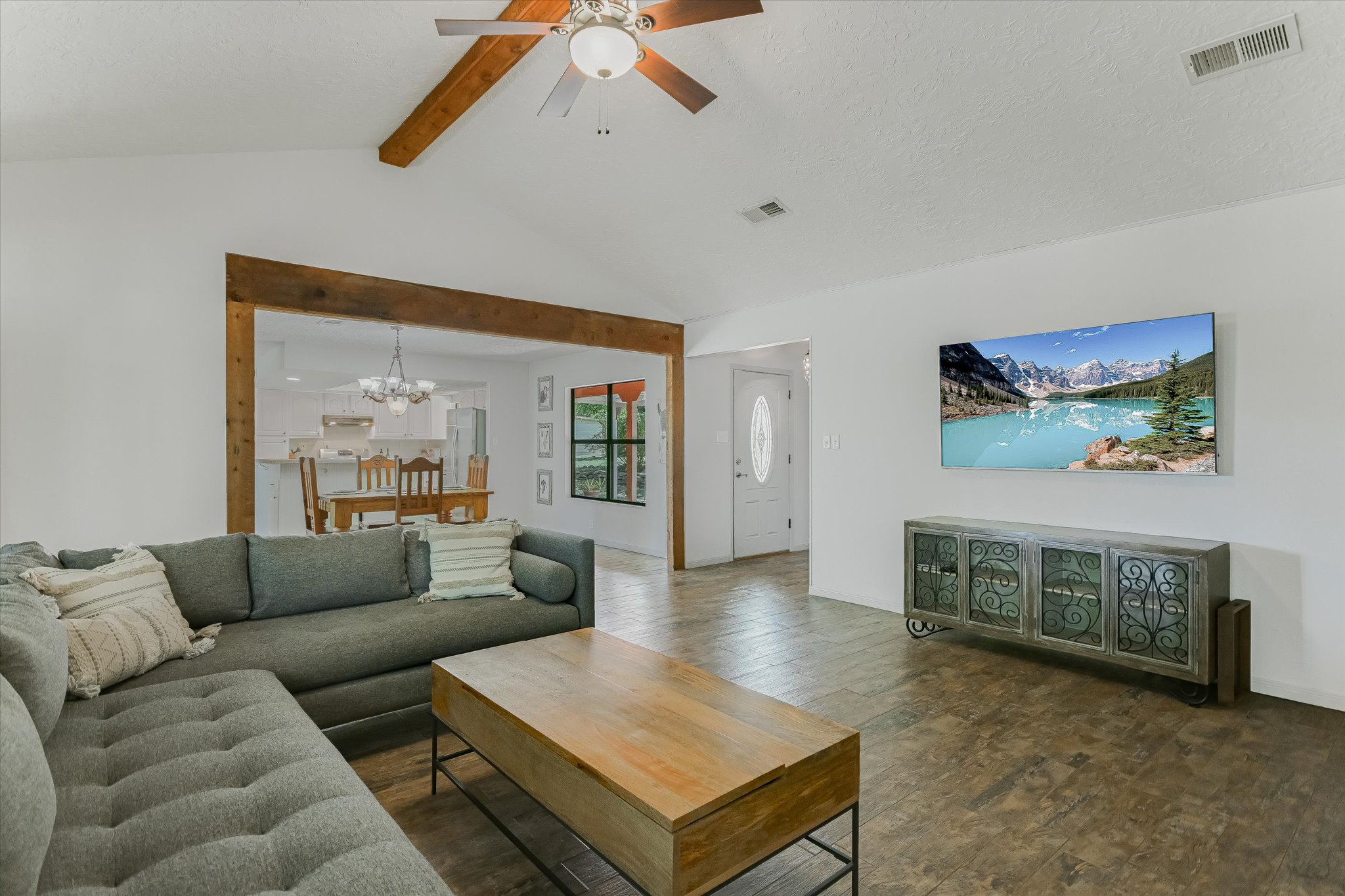 175 Fischer Trail Wimberley, TX 78676 - Photo 3 of 31 a living room with furniture and a large window