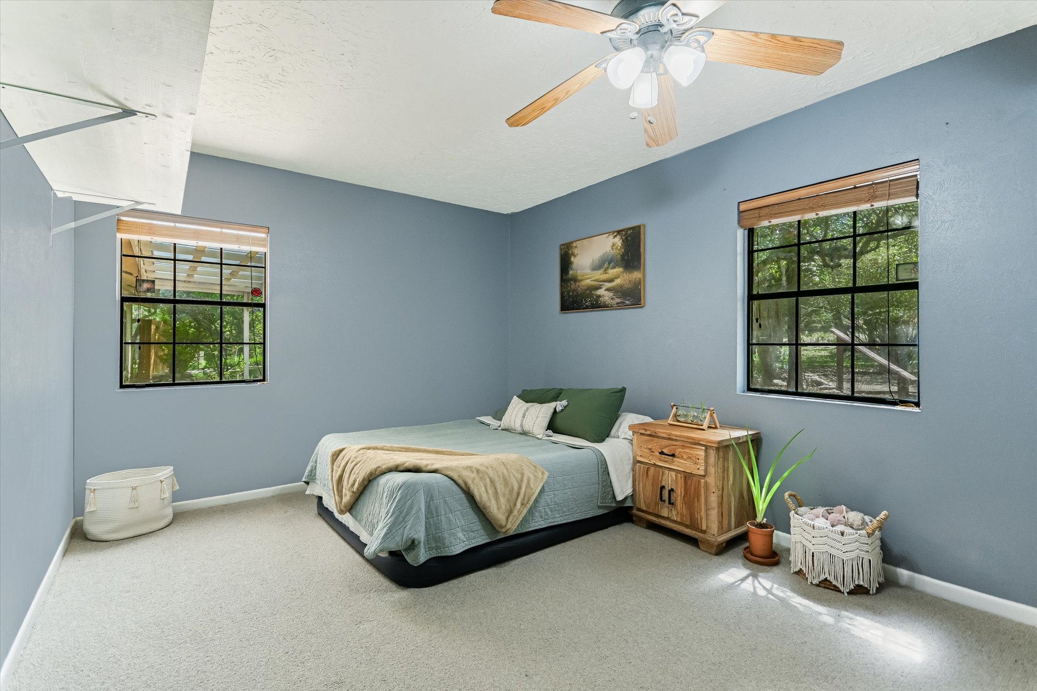 175 Fischer Trail Wimberley, TX 78676 - Photo 9 of 31 a bedroom with bed and a window