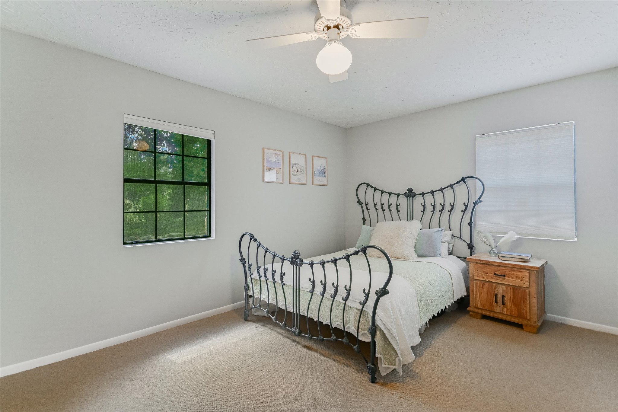 175 Fischer Trail Wimberley, TX 78676 - Photo 10 of 31 a bedroom with a bed and a window
