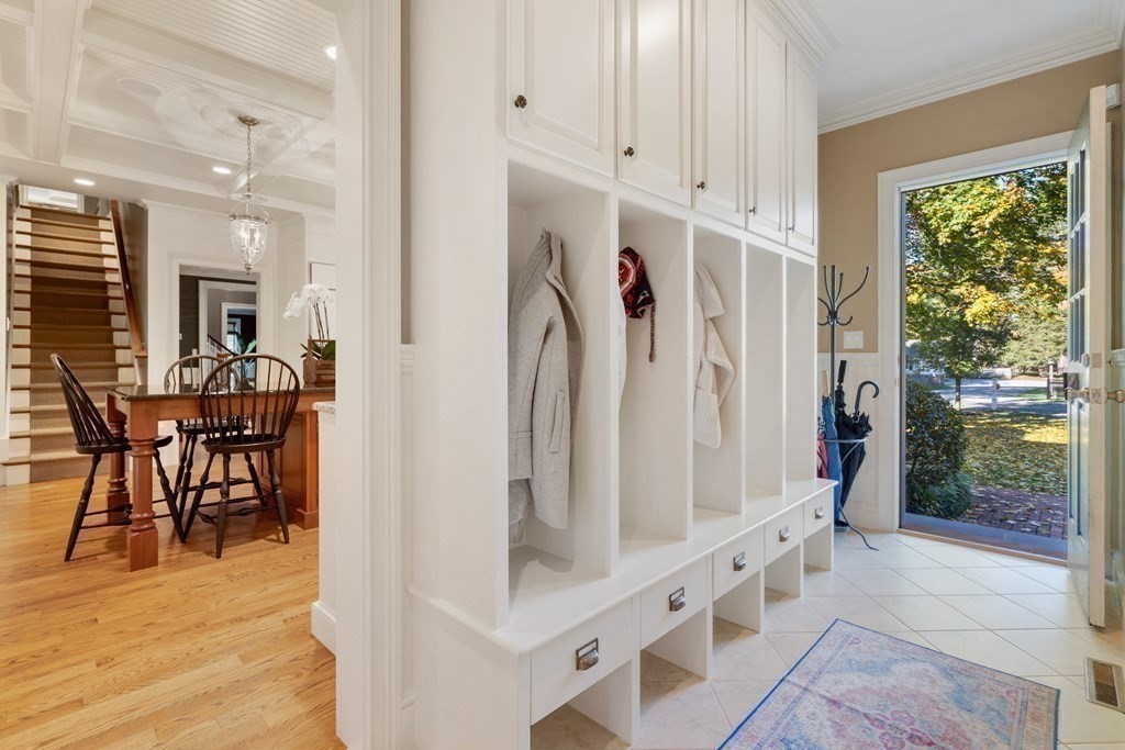 36 Laurel Road Weston, MA 02493 - Photo 25 of 35 a view of an entryway with wooden floor and windows