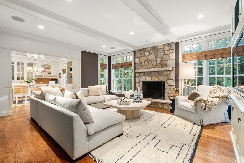 36 Laurel Road Weston, MA 02493 - Photo 3 of 35 a living room with furniture large windows and a fireplace