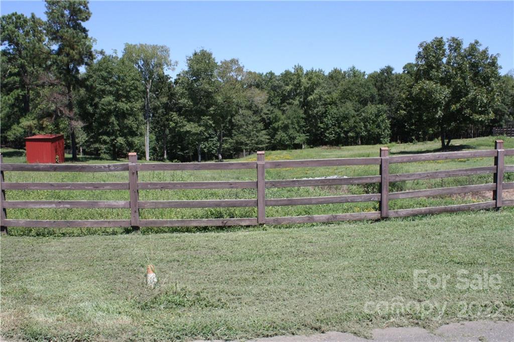 820 Bellegray Road, Unit 14 Clover, SC 29710 - Photo 7 of 7 a view of a yard with wooden fence