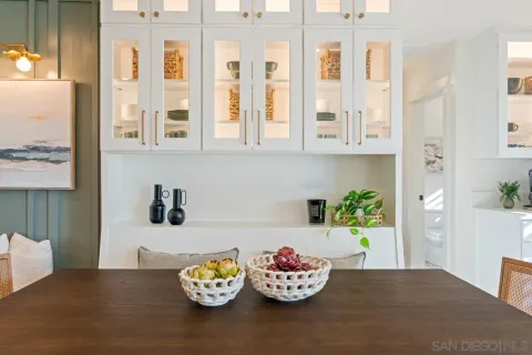 a kitchen with stainless steel appliances a stove a sink and a refrigerator