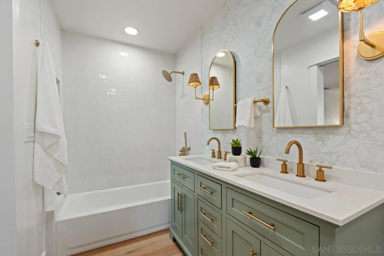 1155 Pepper Drive El Cajon, CA 92021 - Photo 25 of 62 a bathroom with a double vanity sink mirror and bathtub