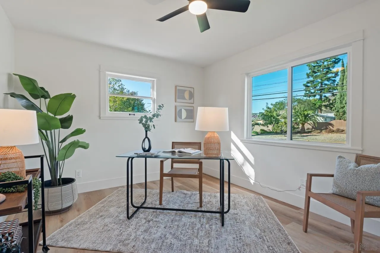 1155 Pepper Drive El Cajon, CA 92021 - Photo 29 of 62 a living room with furniture and a potted plant