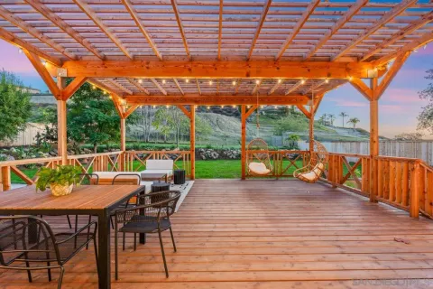 a view of a garden with a building in the background