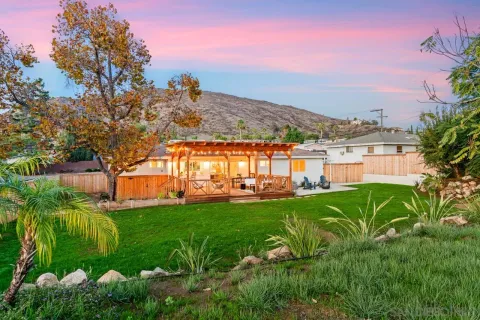 a view of a house with a big yard