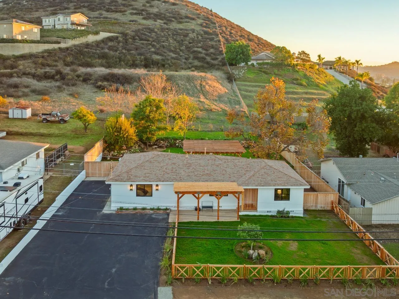 1155 Pepper Drive El Cajon, CA 92021 - Photo 43 of 62 an aerial view of residential houses with outdoor space and trees