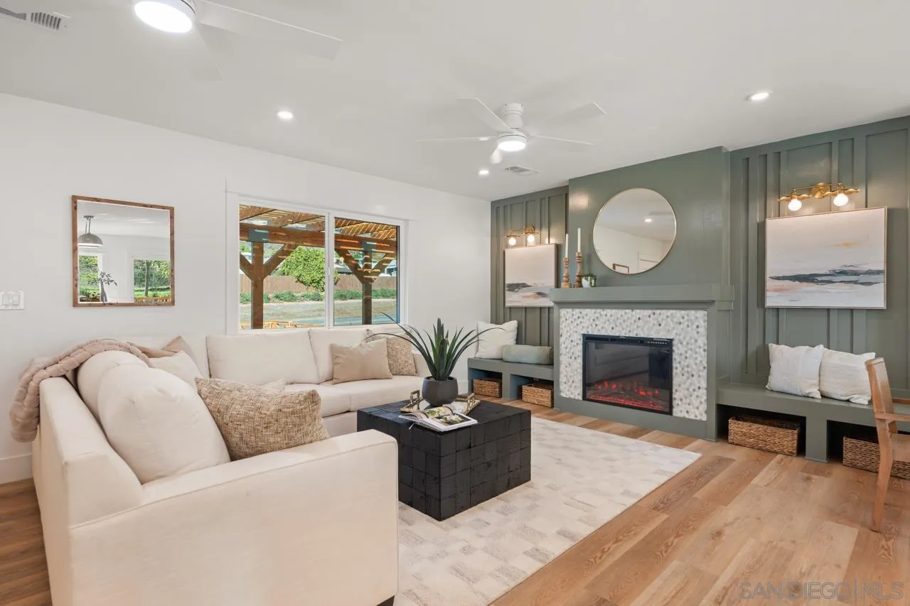 1155 Pepper Drive El Cajon, CA 92021 - Photo 7 of 62 a living room with furniture and a fireplace