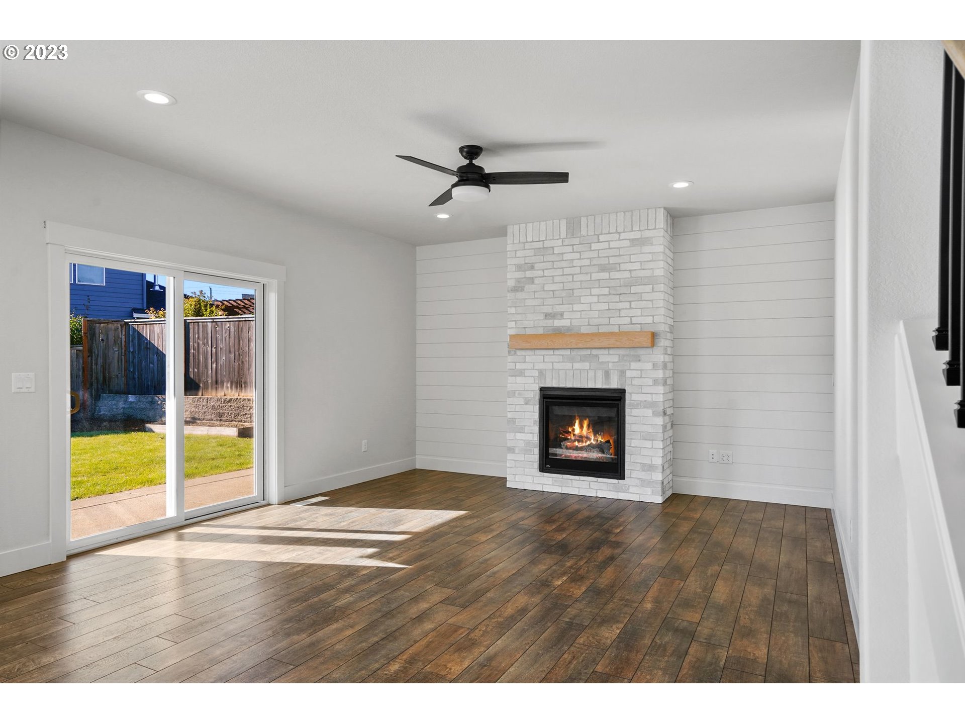 2870 Gehlar Road Northwest Salem, OR 97304 - Photo 9 of 39 a view of an empty room with a fireplace and a window