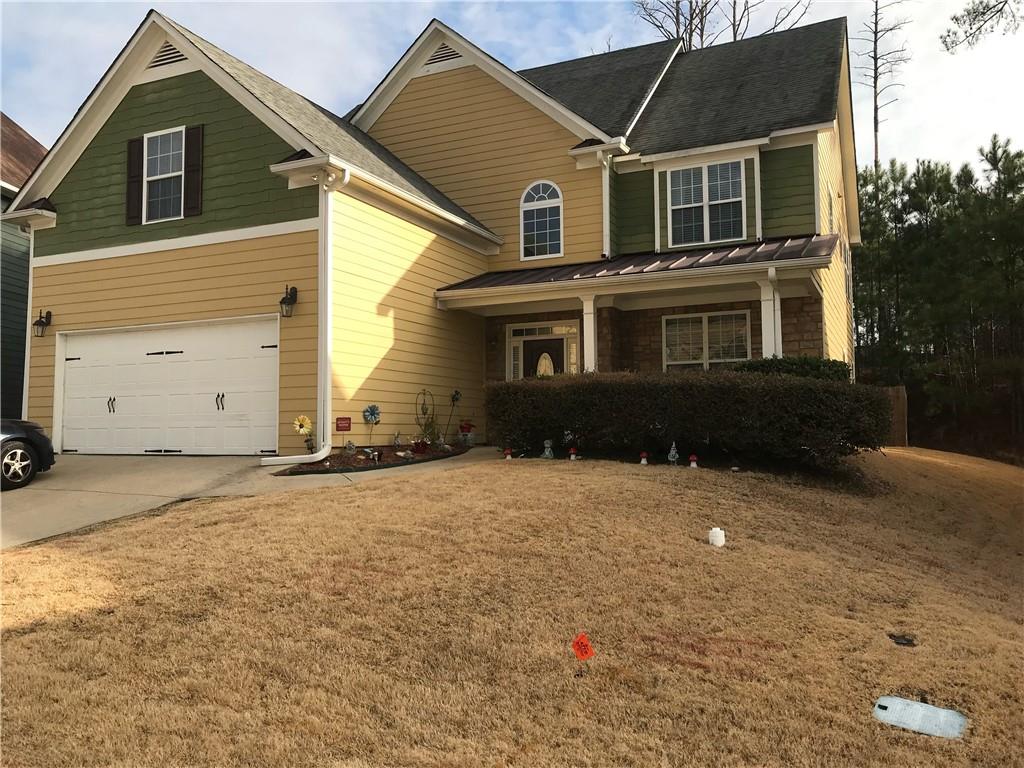 121 Arena Trail Dallas, GA 30157 - Photo 1 of 1 a front view of a house with a yard
