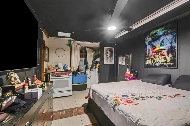 a bed room with bed and furniture