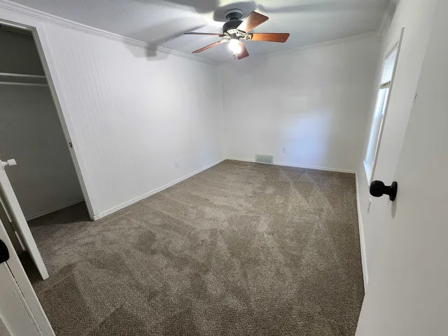 en empty room with windows