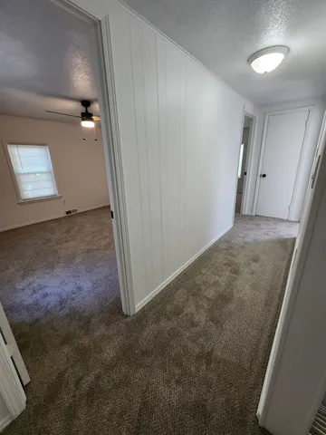 an empty room with a bathroom