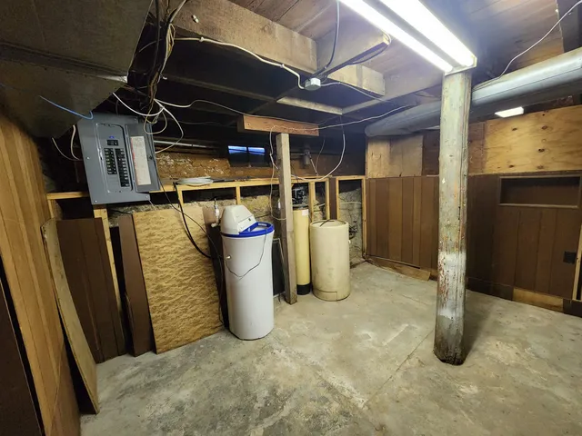 a view of an empty room with windows