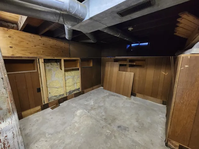 a view of an empty room and window