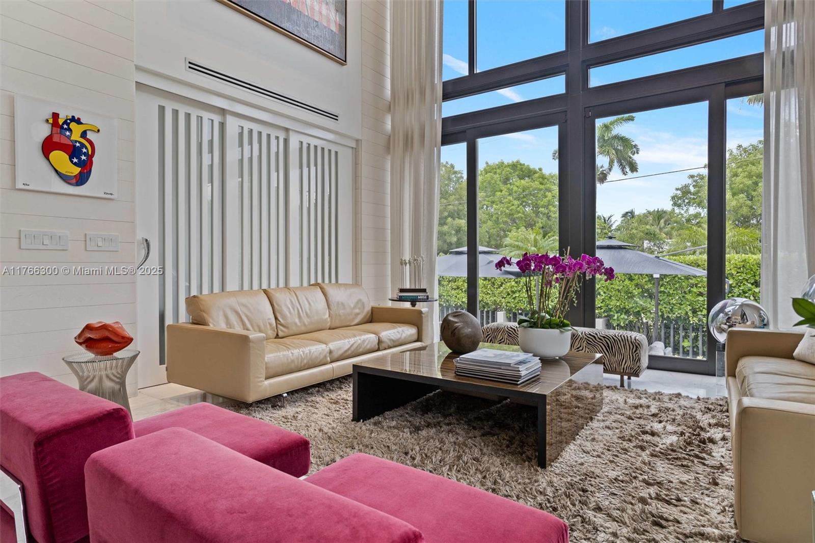 610 Harbor Circle Key Biscayne, FL 33149 - Photo 7 of 71 a living room with furniture and a floor to ceiling window