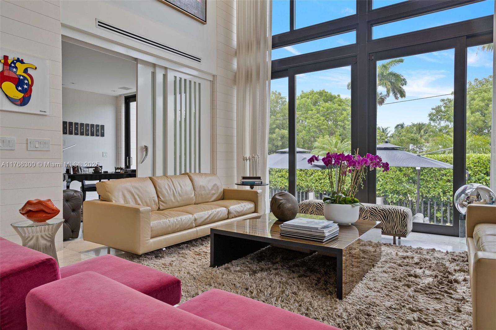 610 Harbor Circle Key Biscayne, FL 33149 - Photo 8 of 71 a living room with furniture and a large window