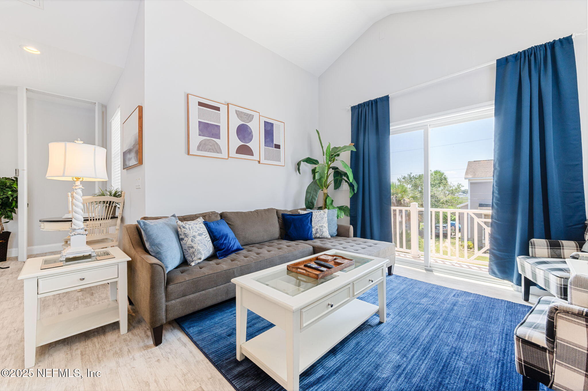 239 Riberia Street St. Augustine, FL 32084 - Photo 12 of 88 a living room with furniture and a large window