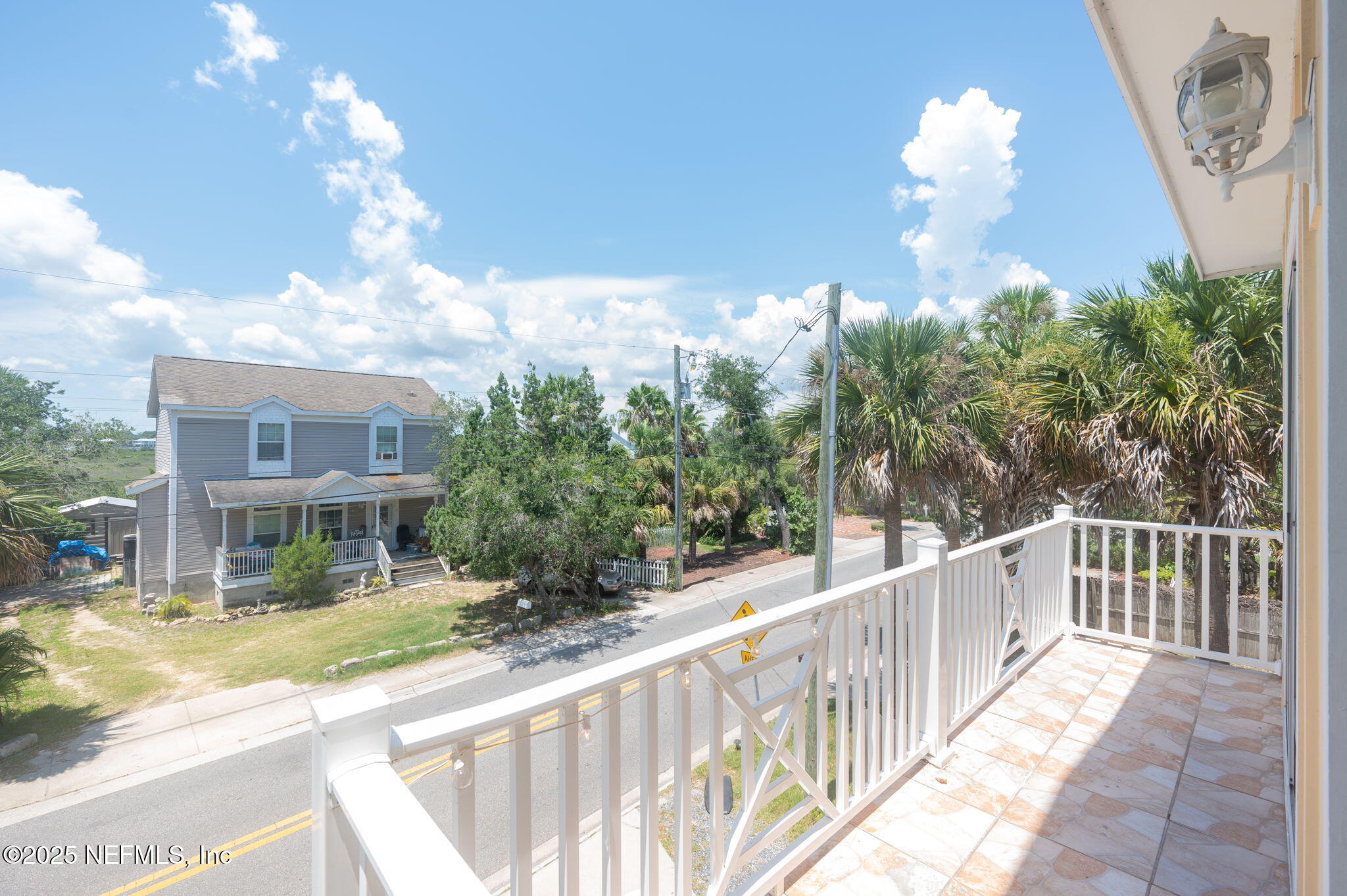 239 Riberia Street St. Augustine, FL 32084 - Photo 13 of 88 a view of a house with a large tree and a yard