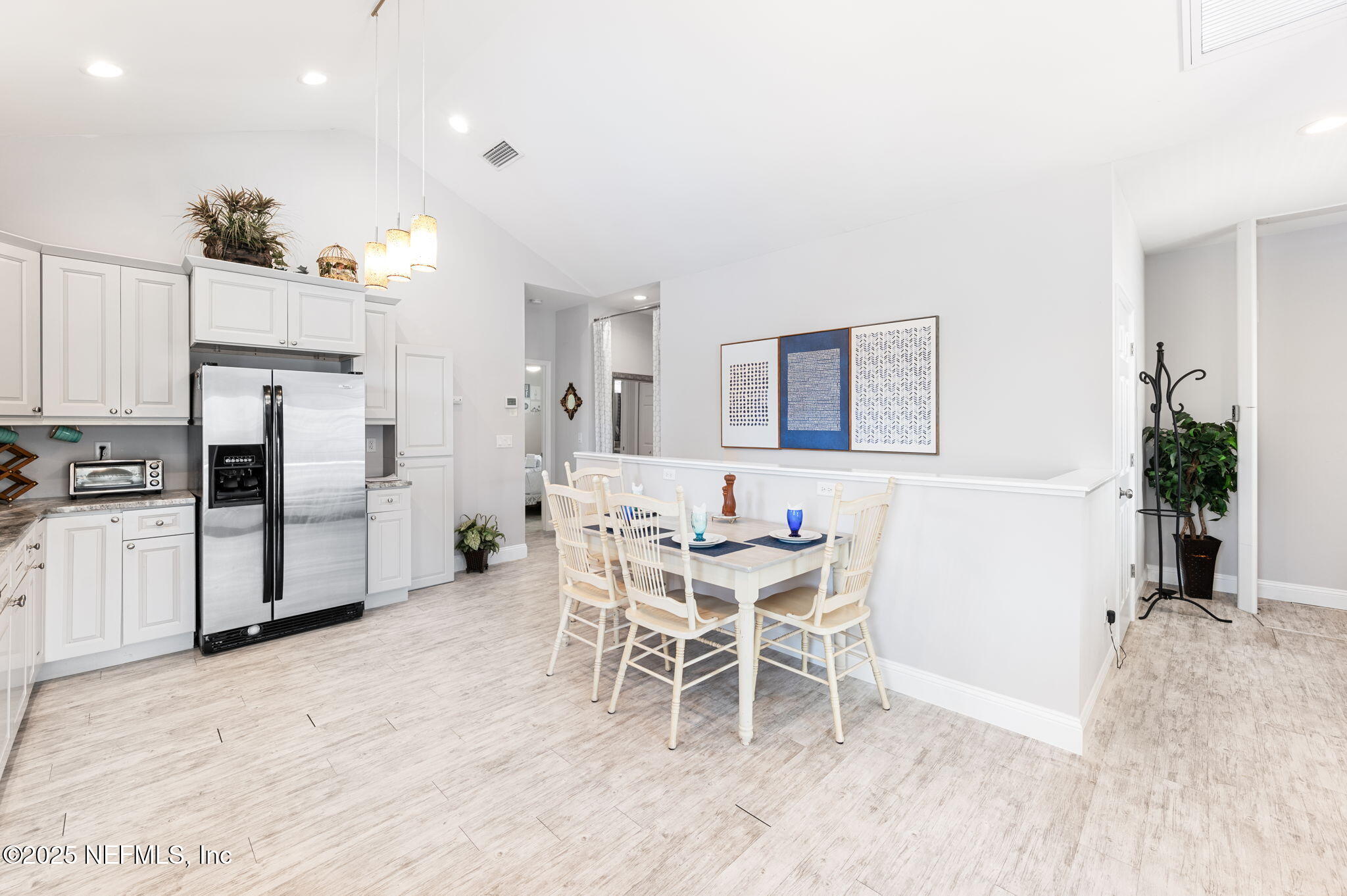 239 Riberia Street St. Augustine, FL 32084 - Photo 19 of 88 a view of a dining room with furniture and kitchen view