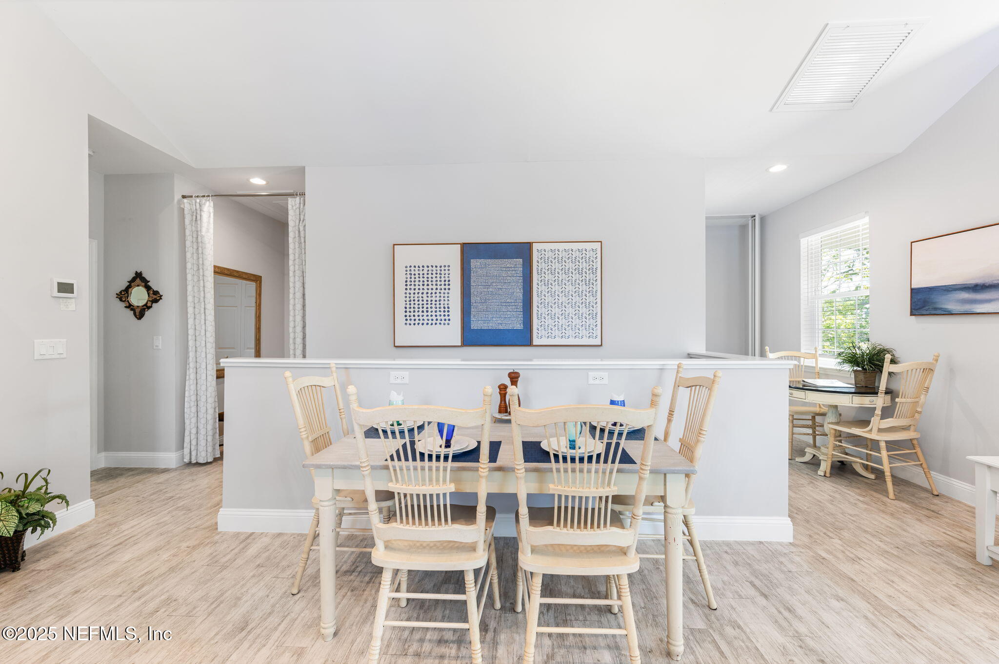 239 Riberia Street St. Augustine, FL 32084 - Photo 22 of 88 a dining room with furniture and wooden floor
