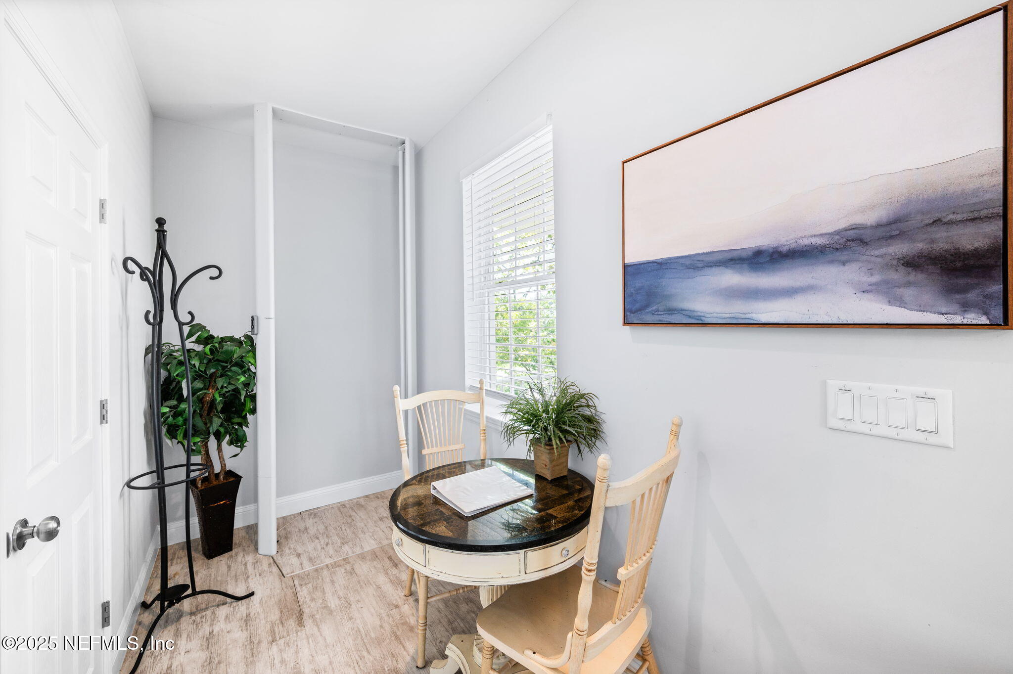 239 Riberia Street St. Augustine, FL 32084 - Photo 23 of 88 a living room with furniture and a potted plant
