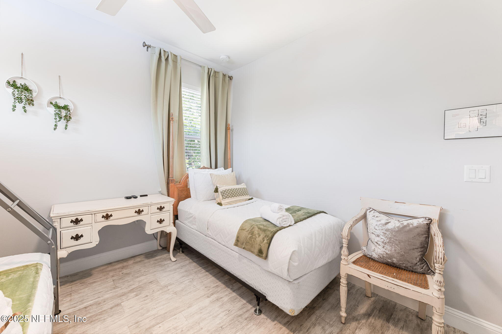 239 Riberia Street St. Augustine, FL 32084 - Photo 26 of 88 a bedroom with a bed and a window