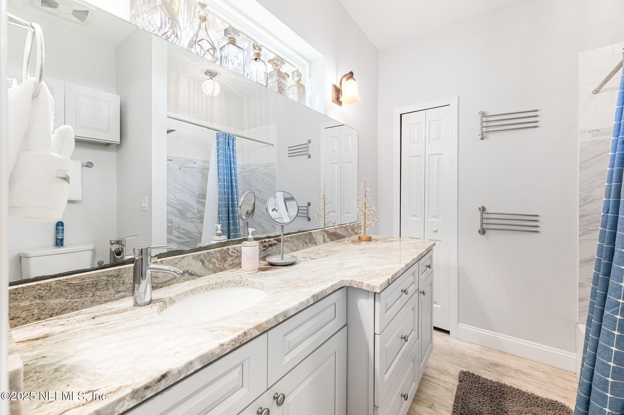 239 Riberia Street St. Augustine, FL 32084 - Photo 30 of 88 a bathroom with a sink double vanity and a mirror
