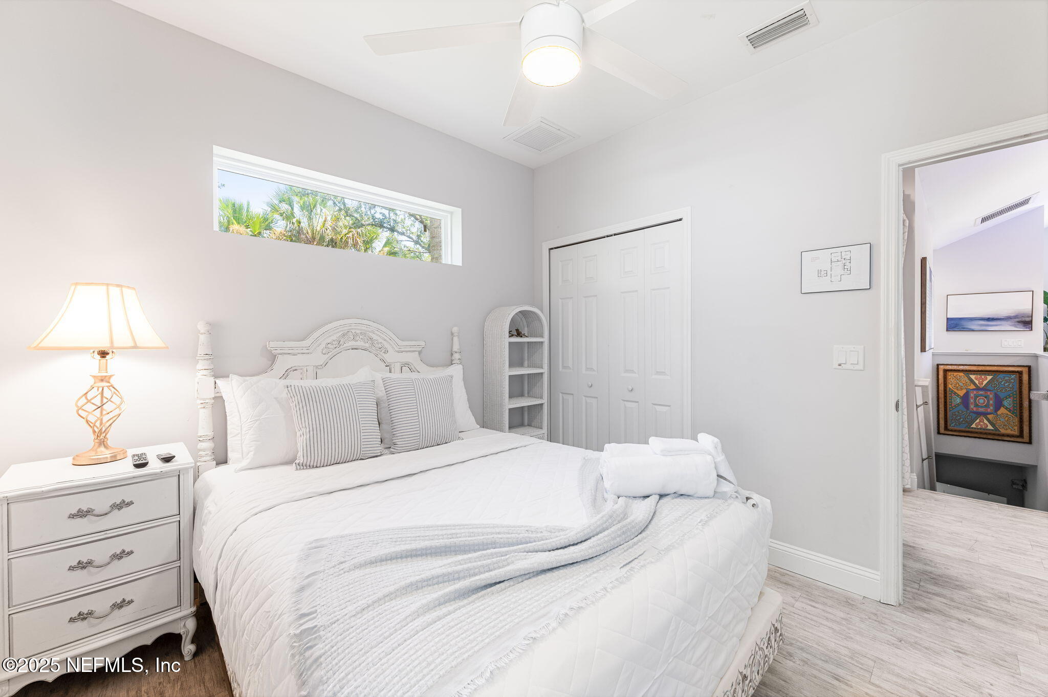 239 Riberia Street St. Augustine, FL 32084 - Photo 34 of 88 a bedroom with a bed and a window