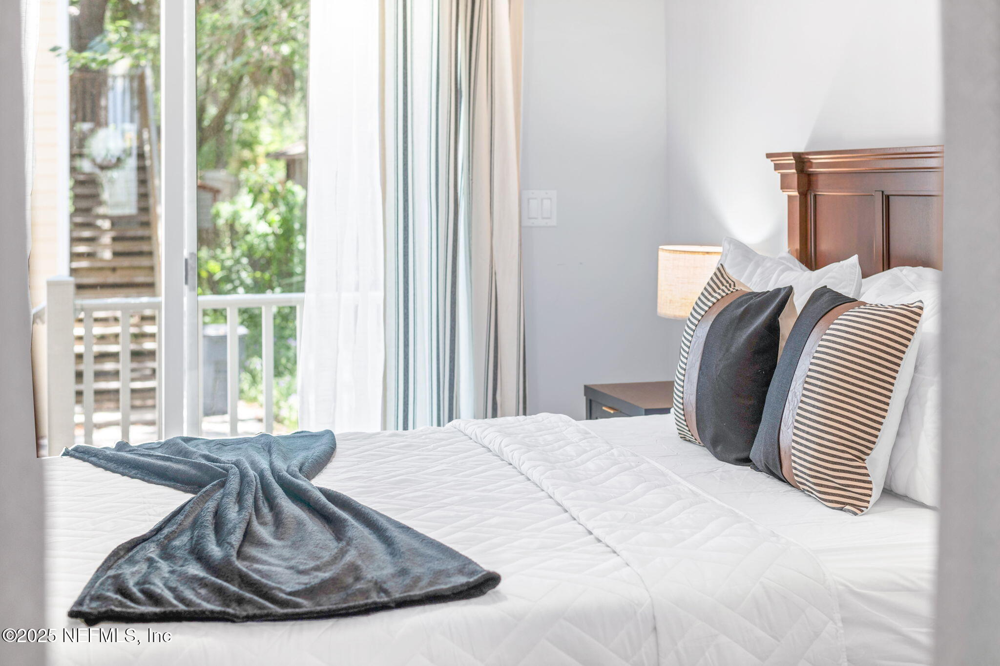 239 Riberia Street St. Augustine, FL 32084 - Photo 50 of 88 a view of a bedroom with furniture and window