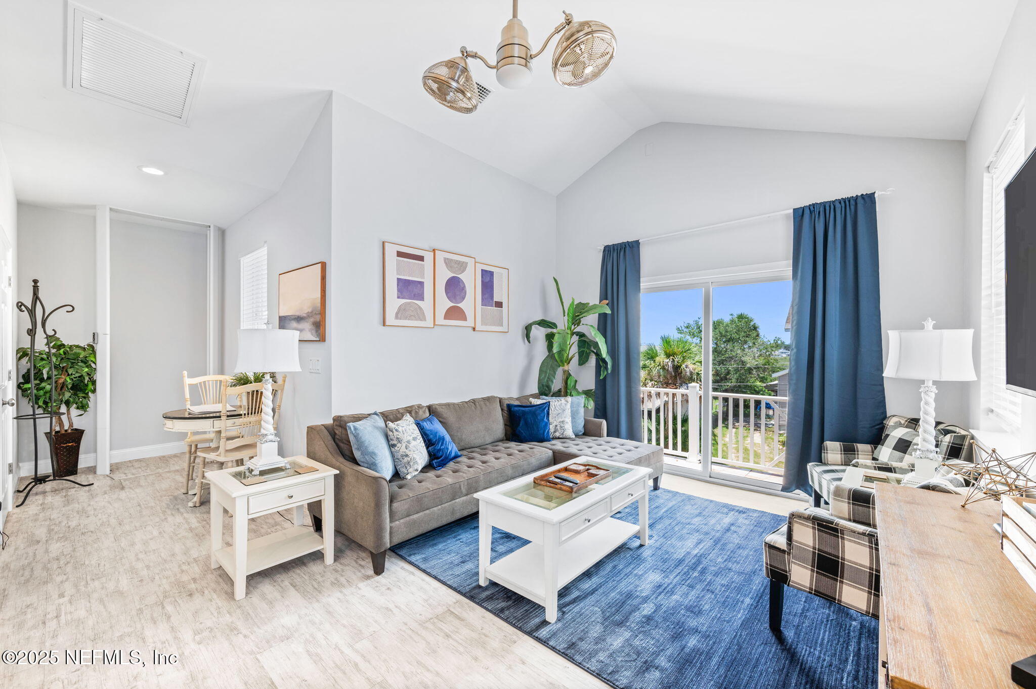 239 Riberia Street St. Augustine, FL 32084 - Photo 5 of 88 a living room with furniture and a large window