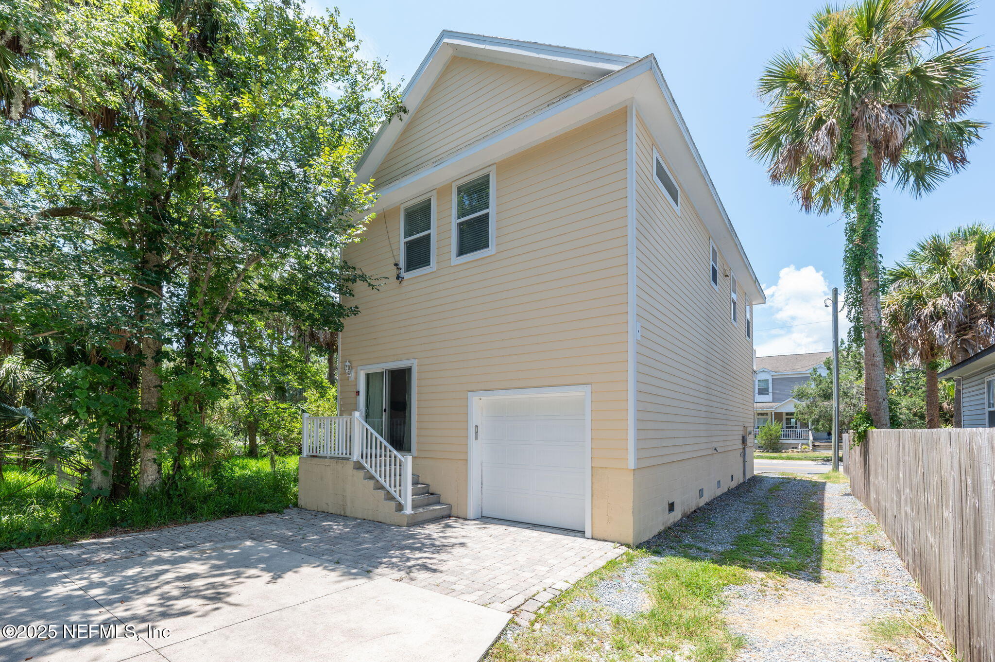 239 Riberia Street St. Augustine, FL 32084 - Photo 55 of 88 a view of a house with a yard and potted plants