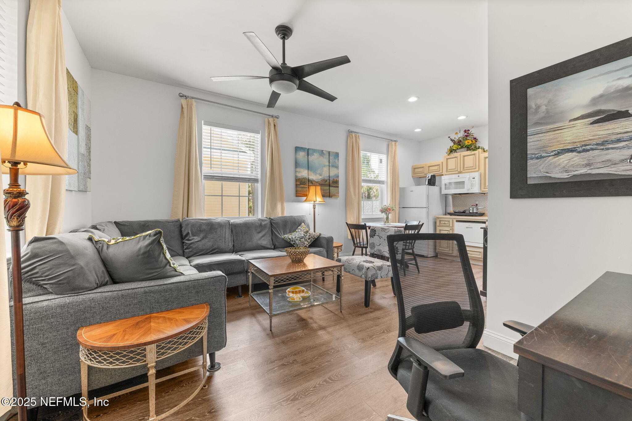 239 Riberia Street St. Augustine, FL 32084 - Photo 64 of 88 a living room with furniture and wooden floor