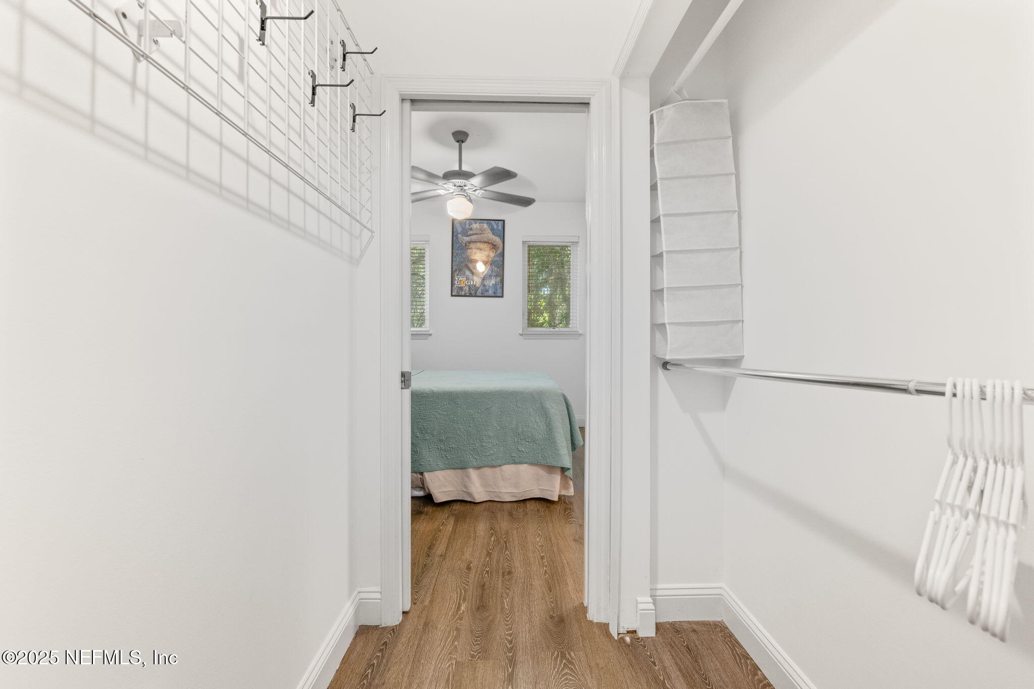 239 Riberia Street St. Augustine, FL 32084 - Photo 72 of 88 a view of a hallway with wooden floor and staircase