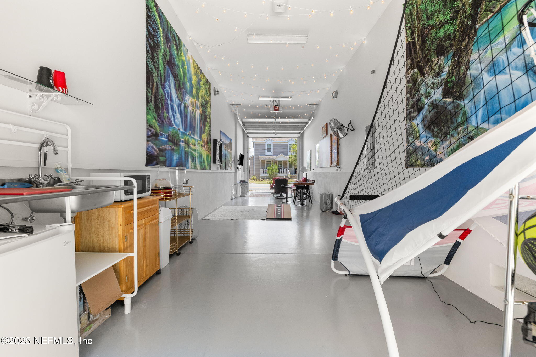 239 Riberia Street St. Augustine, FL 32084 - Photo 79 of 88 a living room with furniture and a potted plant