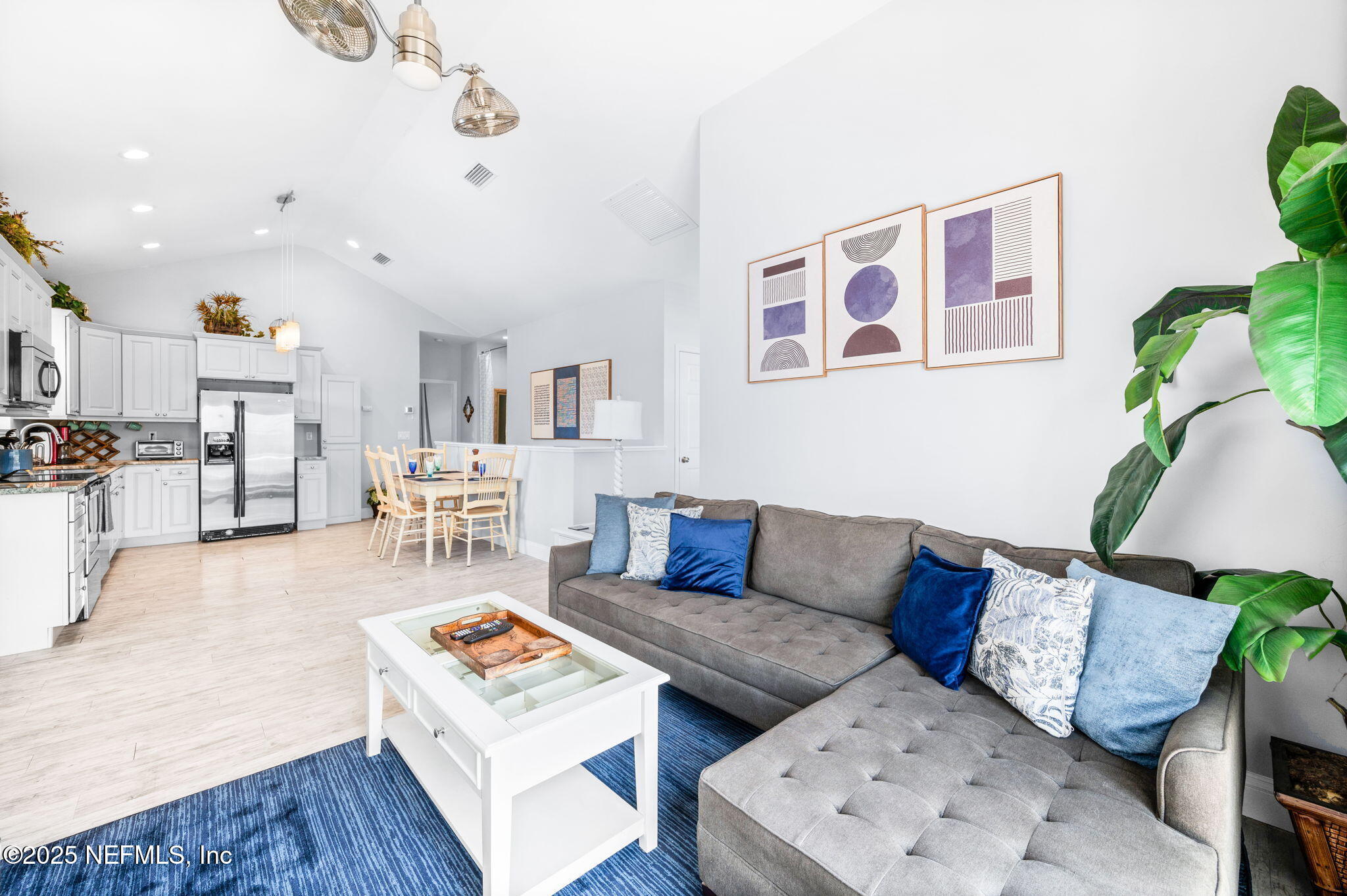239 Riberia Street St. Augustine, FL 32084 - Photo 8 of 88 a living room with furniture and wooden floor