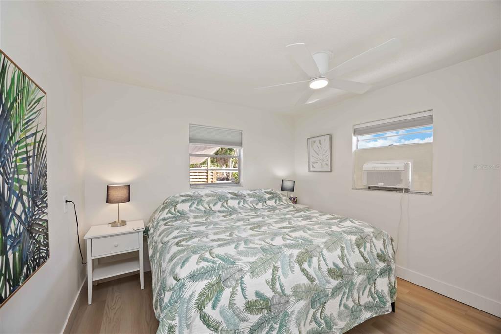 5075 North Beach Road, Unit B4 Englewood, FL 34223 - Photo 28 of 79 a bedroom with a bed and a window