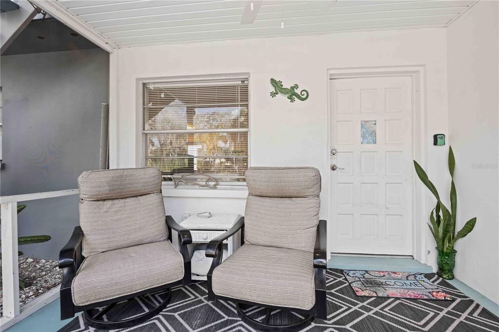 5075 North Beach Road, Unit B4 Englewood, FL 34223 - Photo 33 of 79 a living room with furniture and wooden floor
