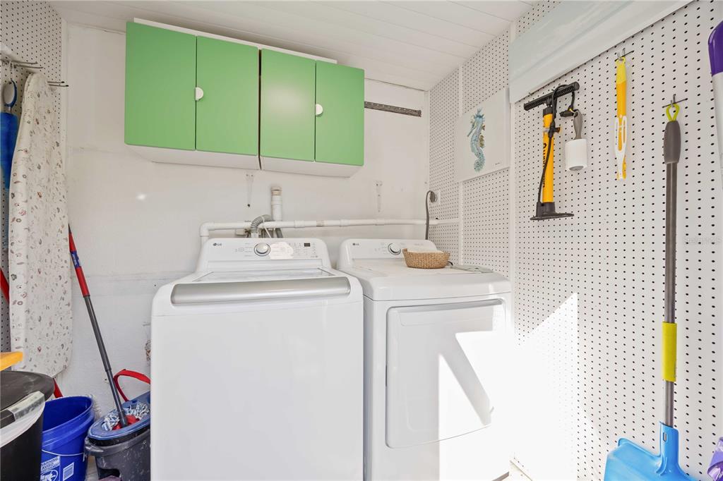 5075 North Beach Road, Unit B4 Englewood, FL 34223 - Photo 48 of 79 a bathroom with a sink and a mirror
