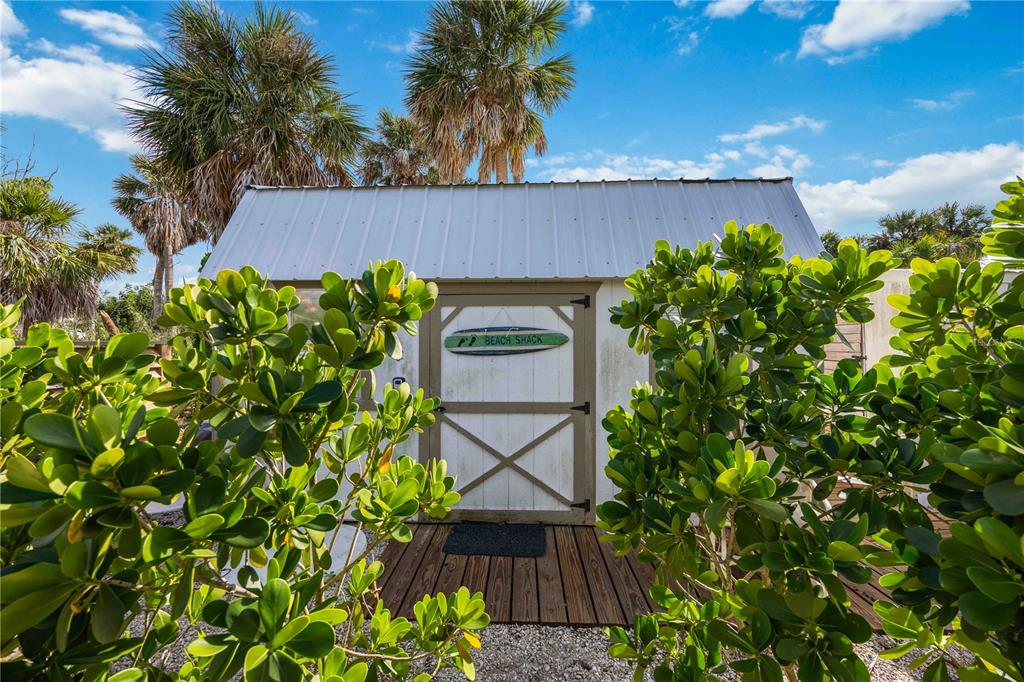 5075 North Beach Road, Unit B4 Englewood, FL 34223 - Photo 53 of 79 a view of a garden