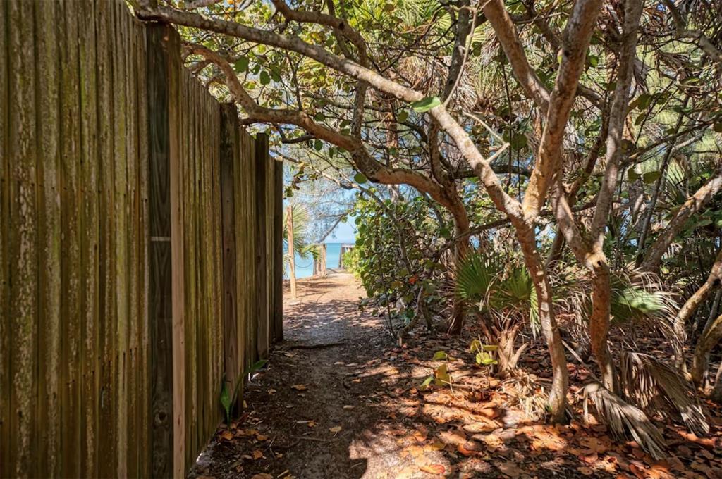 5075 North Beach Road, Unit B4 Englewood, FL 34223 - Photo 56 of 79 a view of a backyard of the house