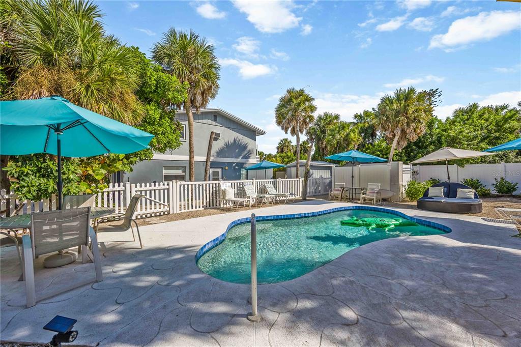5075 North Beach Road, Unit B4 Englewood, FL 34223 - Photo 7 of 79 a garden view with a seating space