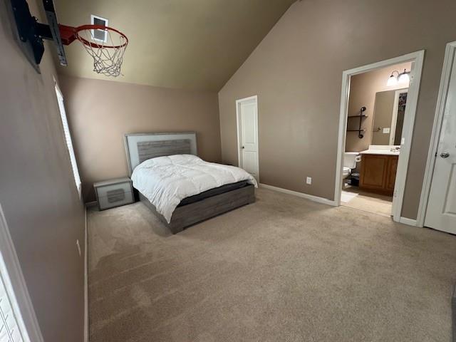 3715 Slater Street Cumming, GA 30041 - Photo 32 of 36 a spacious bedroom with a bed and a walk in closet