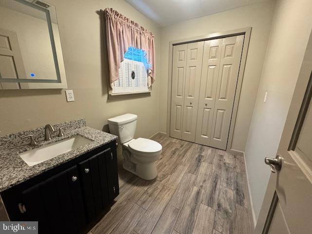 338 Ridge Road Browns Mills, NJ 08015 - Photo 11 of 38 a spacious bathroom with a granite countertop sink toilet and a mirror