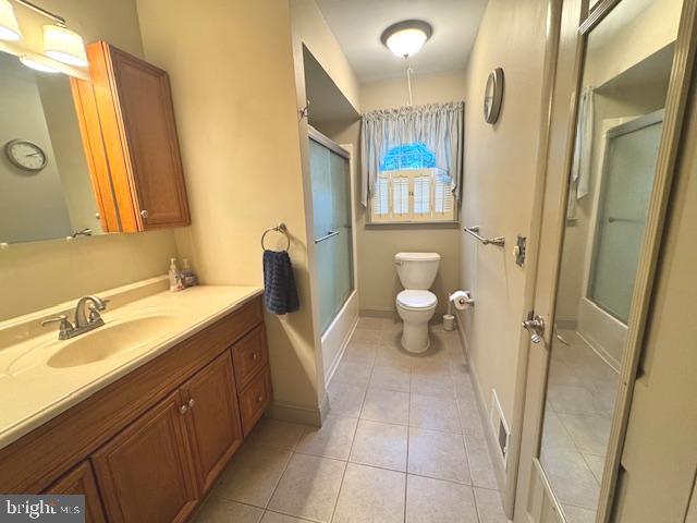 338 Ridge Road Browns Mills, NJ 08015 - Photo 18 of 38 a bathroom with a sink a toilet and a mirror