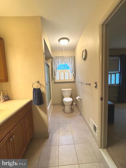 338 Ridge Road Browns Mills, NJ 08015 - Photo 20 of 38 a bathroom with a toilet sink and mirror