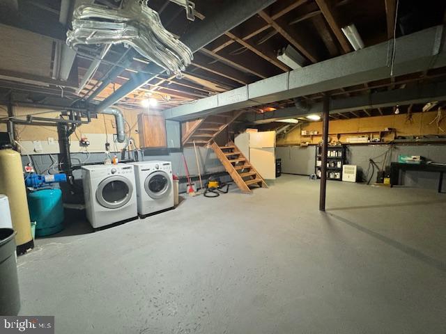 338 Ridge Road Browns Mills, NJ 08015 - Photo 24 of 38 a utility room with dryer washer and a view of kitchen