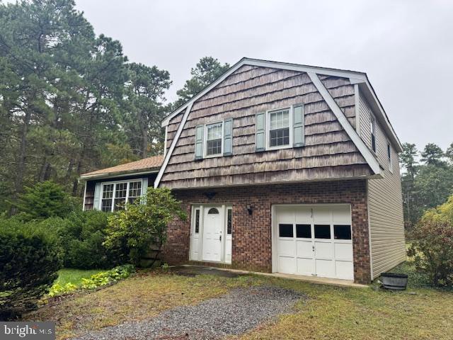 338 Ridge Road Browns Mills, NJ 08015 - Photo 3 of 38 a front view of a house with a yard