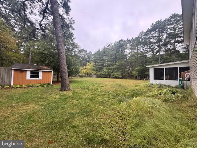 338 Ridge Road Browns Mills, NJ 08015 - Photo 33 of 38 a view of a house with yard and a tree
